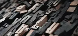 A collection of wooden type blocks - header image from the graphic design blog by nstudio