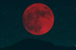 a red moon - a composite image from two photographs - header image from the graphic design blog by nstudio