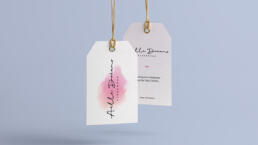 clothing tags showing the aella dreams logo - a fashion logo design project by nstudio