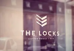 the locks logo on glass