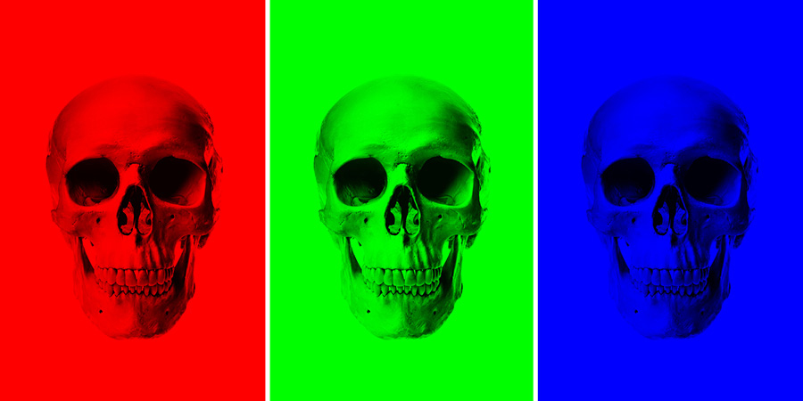 three isolated skulls demonstrating effects achieved by using channel colour separations in photoshop