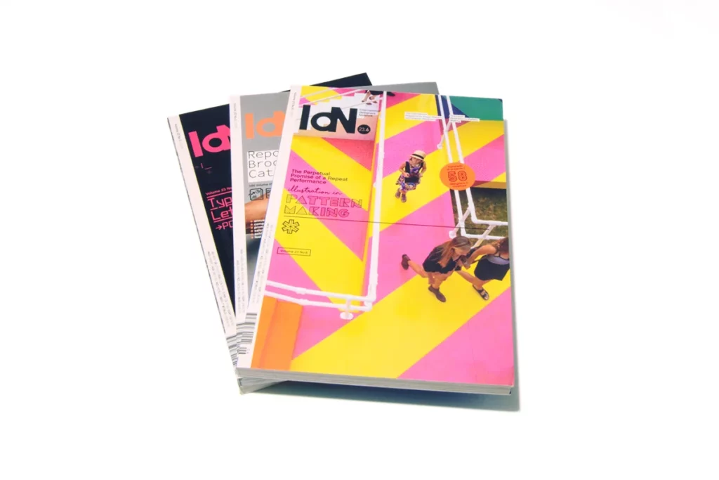Three issues of the international design magazine IdN. Isolated on a white background