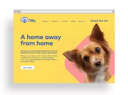 a mockup of the happy hounds website landing page