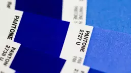 a macro image of blue pantone colour swatches