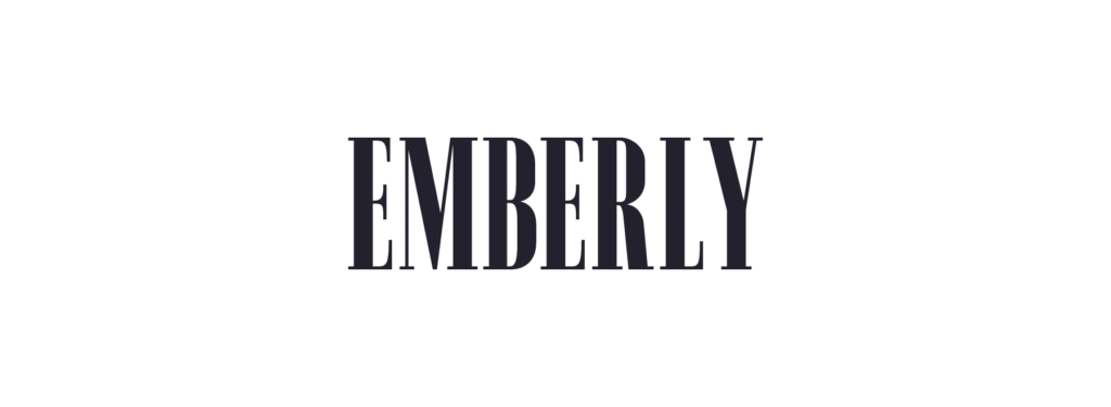 Emberly set on a light orange background