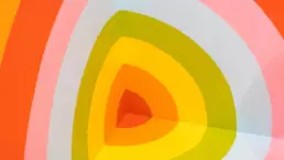 A close up detail photo of wall art takes the appearance of a colourful chart